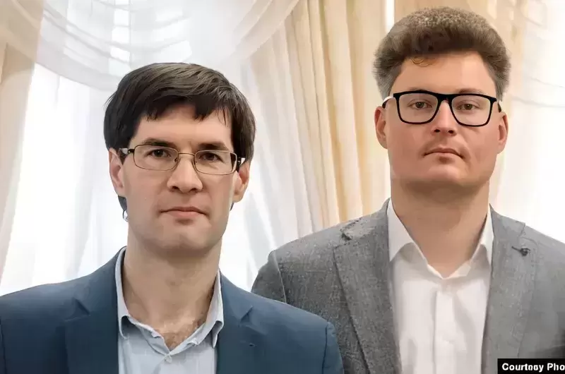 Lawyers Syarhey Zikratski and Dzimtry Laeuski